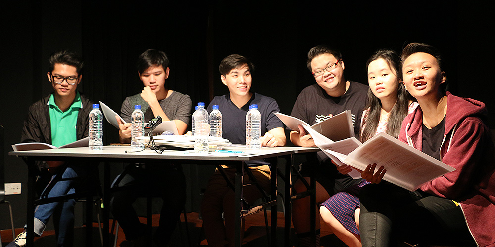 Eugene Koh (extreme left) performing in "The Vault: Project Understudy" in 2016 with the rest of NUS Thespis.