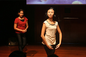 Jocelyn (right) and Nidya Shanthini (left) performing in "The Vault: Becoming Mother" (2017).